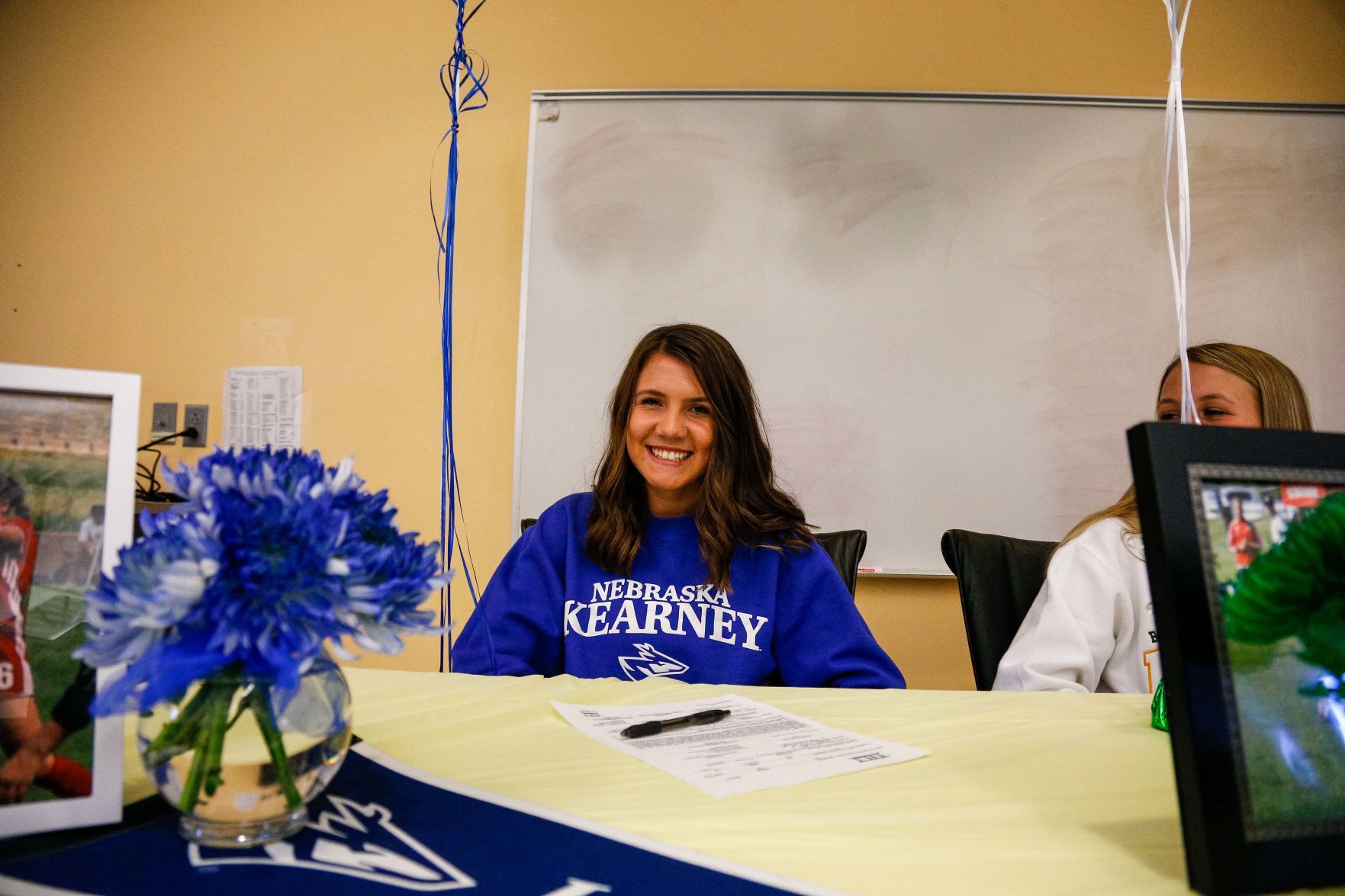 SIGNING DAY: Rampart athletes sign their National Letter of Intent